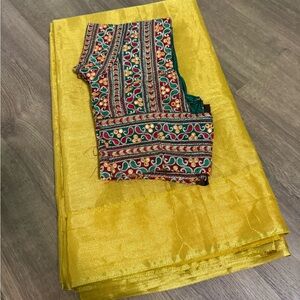 Beautiful gold color saree with blouse